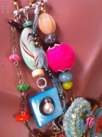 close up of felted and mix media jewellery components
