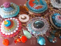 close up of felted and mix media jewellery components