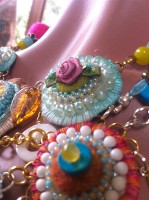 close up of felted and mix media jewellery components