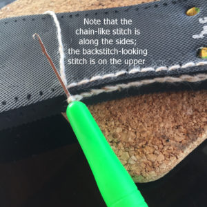 hooking yarn onto soles for crochet booties